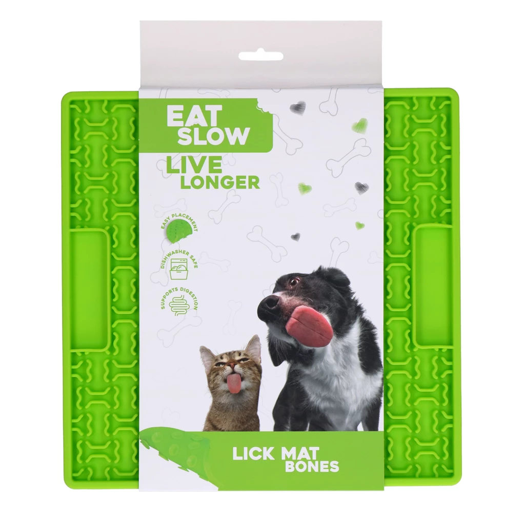 Grüne Schleckmatte ‚Eat Slow Live Longer – Lick Mat Bones‘ für Hunde und Katzen, in Verpackung mit Tierabbildungen und Hinweisen zu Verdauungsförderung und Anwendung.