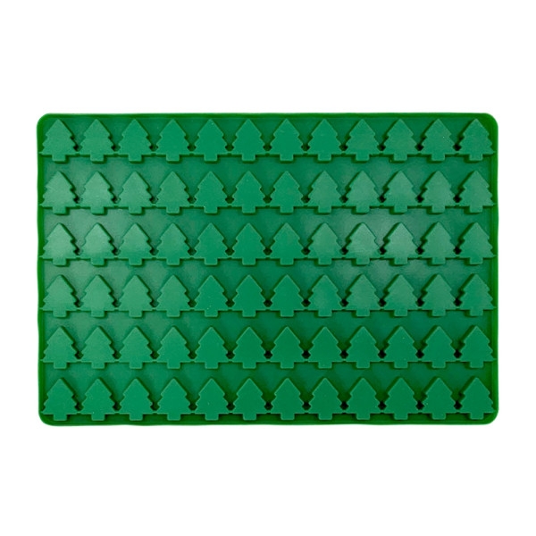 Grüne Silikonform mit vielen kleinen Mulden in Form von Tannenbäumen