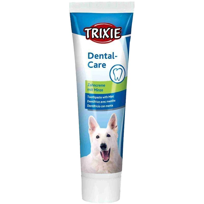 Trixie Hundezahncreme mit MinzeWeiße Tube mit blauem Etikett, darauf ein Bild eines weißen Hundes sowie mehrsprachige Beschriftung in klarer, strukturierter Anordnung.