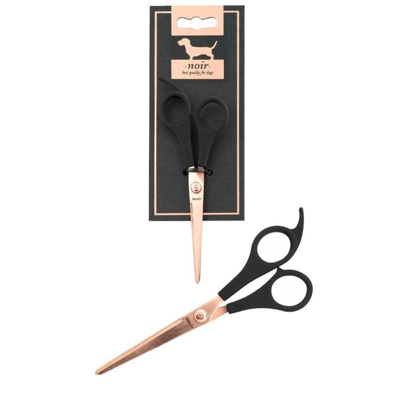 Hundeschere mit schwarzem Griff und gezackter Metallklinge. Die Schere ist in einer Verpackung mit Hundesilhouette und schlichtem Design präsentiert.