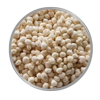 Kreisförmig eingefasste, gepuffte, helle Kügelchen mit glatter Oberfläche und leicht unregelmäßiger Form, gleichmäßig verteilt.