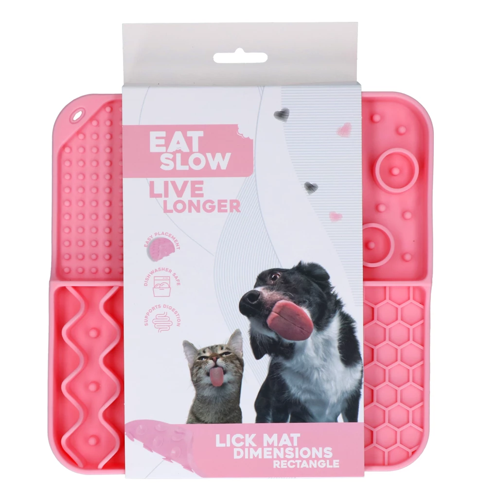Rosa Schleckmatte ‚Eat Slow Live Longer‘ für Hunde und Katzen, mit Tierabbildungen auf der Verpackung und Hinweisen zu einfacher Anwendung und Spülmaschineneignung.