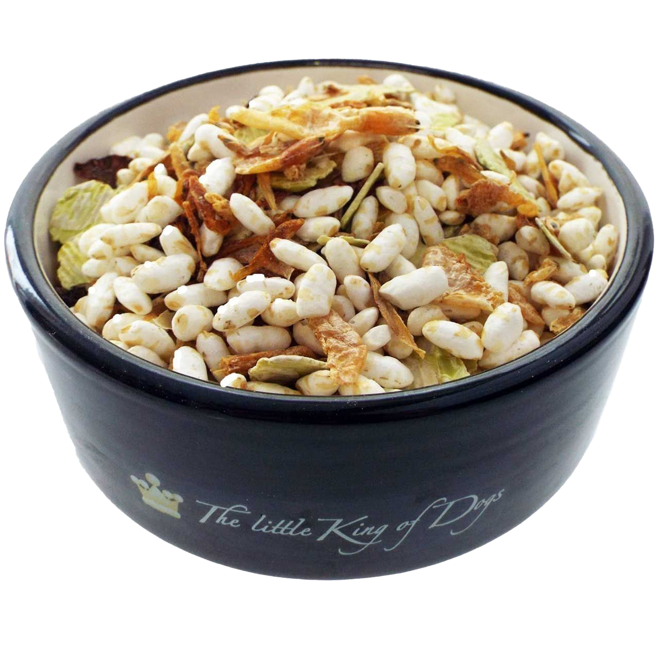 Eine Futtermischung mit weißen Puffreisstücken, getrockneten Gemüseflocken in Beige, Grün und Braun, in einer schwarzen Schale mit heller Innenfläche serviert.