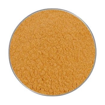 Ein kreisförmig ausgeschnittener Blick auf ein kräftig orangefarbenes Pulver mit fein-körniger, leicht klumpiger Struktur. Der Bildhintergrund ist nicht sichtbar.