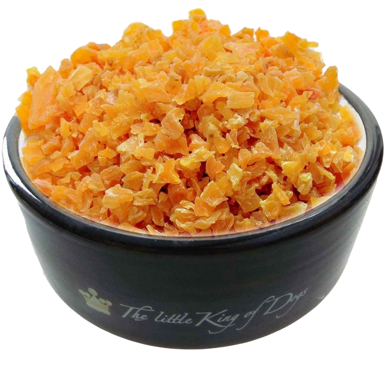 Kleine orange-gelbe Gemüsewürfel mit leicht glänzender Oberfläche in einer schwarzen Schale mit weißer Innenwand, beschriftet mit „The little King of Dogs“.