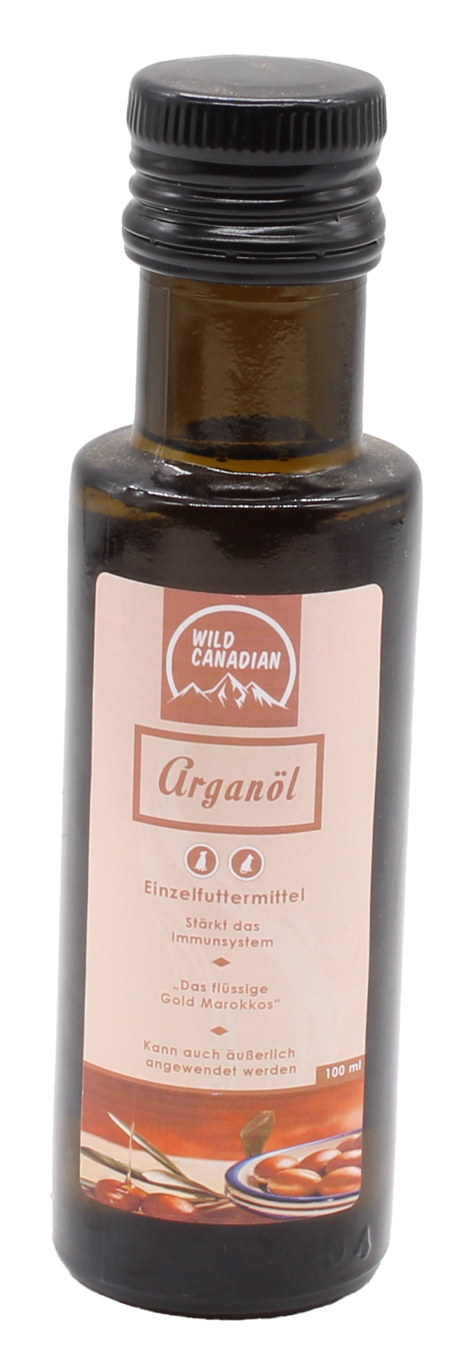 Eine braune Glasflasche mit schwarzem Schraubverschluss und beigem Etikett der Marke „Wild Canadian“. Darauf steht „Arganöl“ mit Abbildungen von Arganfrüchten und einem blauen Teller.