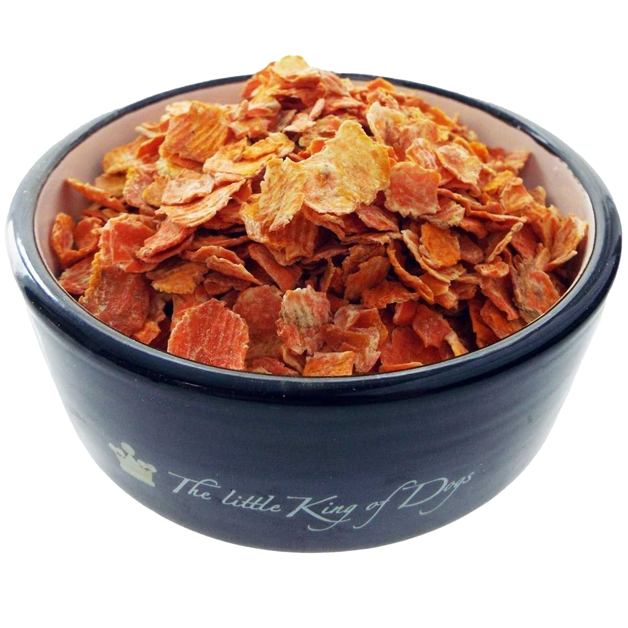 Ein schwarzer Napf mit der Aufschrift „The little King of Dogs“, gefüllt mit orangefarbenen, flachen Möhrenflocken. Die Flocken sind dünn, unregelmäßig geformt und leicht gewellt.