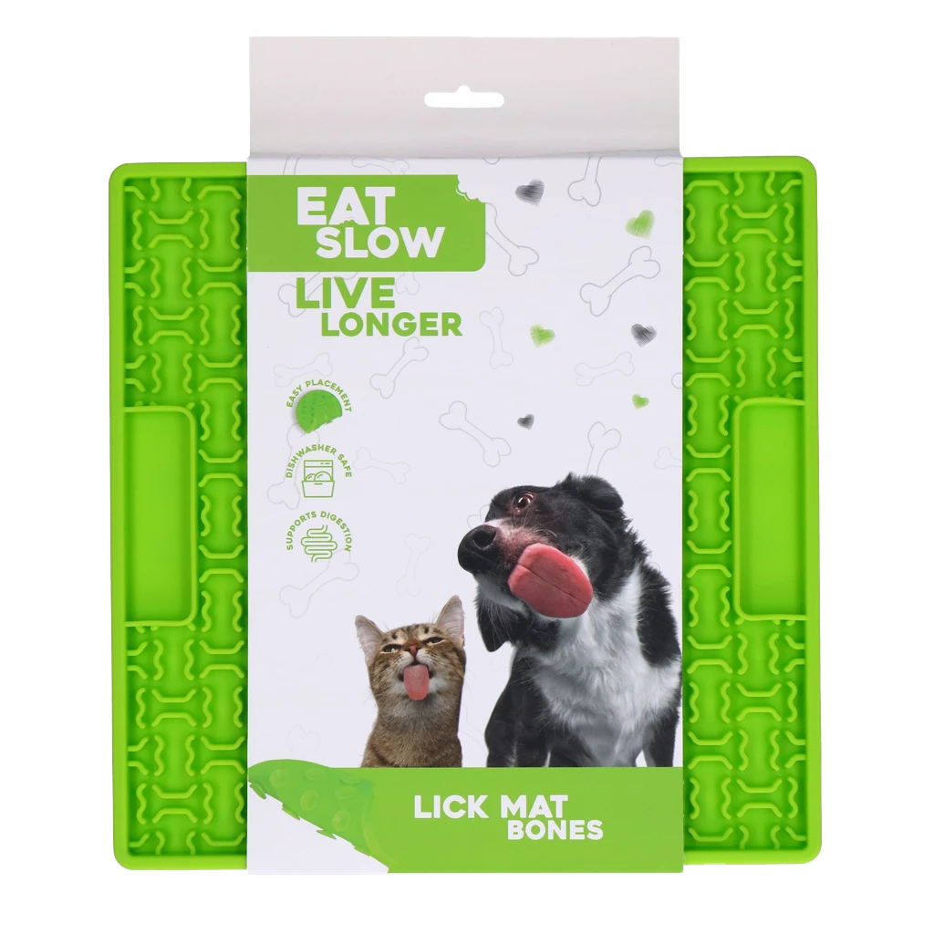 Grüne Schleckmatte ‚Eat Slow Live Longer – Lick Mat Bones‘ für Hunde und Katzen, in Verpackung mit Tierabbildungen und Hinweisen zu Verdauungsförderung und Anwendung.