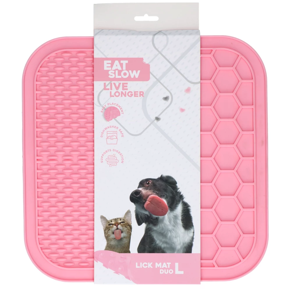 Rosa Schleckmatte ‚Eat Slow Live Longer‘ für Hunde und Katzen, mit Tierabbildungen auf der Verpackung und Hinweisen zu Zahnpflege und stressreduzierender Wirkung.