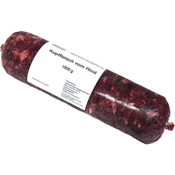 Vakuumverpackte Wurstrolle mit der Aufschrift „Kopffleisch vom Rind – 1000 g“, verpackt in einem nicht essbaren Kunstdarm. Das Einzelfuttermittel für Hunde enthält grob gewolftes Rinderkopffleisch zur artgerechten Rohfütterung