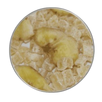 Ein Mix aus kleinen, hellen Würfeln und größeren, gelblichen Fruchtstücken in Halbmondform. Die Mischung wirkt weich und leicht klebrig.