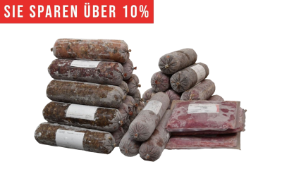 Ein BARF-Sparpaket mit zwei gestapelten Haufen runder Frostfleischrollen in grauem Kunstdarm und drei flachen Beuteln mit rötlichem Inhalt. Oben roter Hinweis „Sie sparen 10 %“.