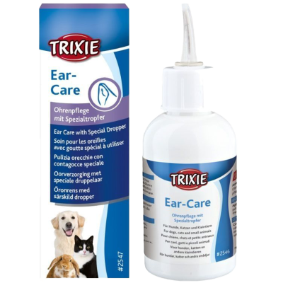 Weiße Flasche mit blauem Etikett und Tropfaufsatz, daneben Verpackung mit Bildern von Hund, Katze und Kaninchen sowie mehrsprachiger Beschriftung.