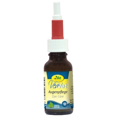 Kleine braune Flasche mit weiß-rotem Tropfverschluss, zylindrische Form, glatte Oberfläche, Etikett mit grünen und roten Designelementen.