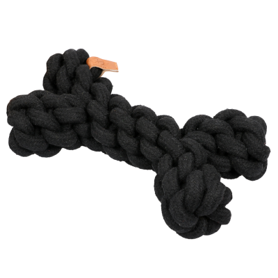 Hundespielzeug in Knochenform aus dickem, schwarzem, geflochtenem Seil mit kleinem braunem Etikett an einem Ende.