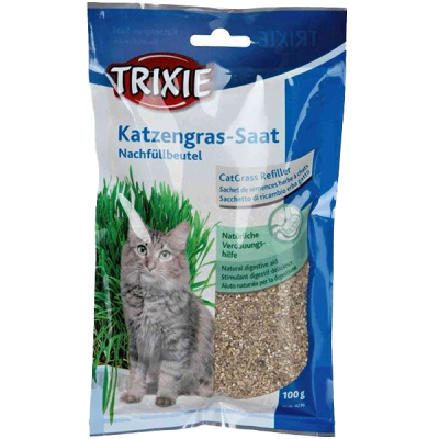 Verpackung mit Bild einer Katze neben grünem Gras, Gestaltung in Blau- und Grüntönen mit weißen Flächen und glatter, rechteckiger Form.