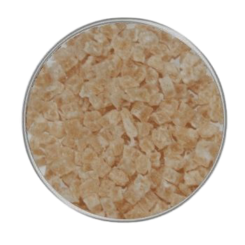 Kleine, gleichmäßig geschnittene Pfirsischwürfel in hellem Orange-Beige mit leicht kristalliner Oberfläche, in einer runden Metallschale präsentiert.